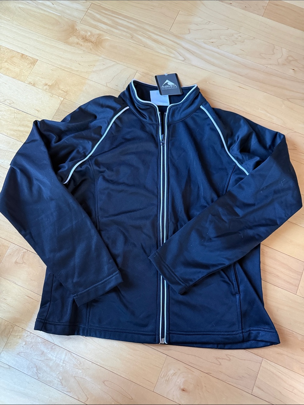 Augusta Sportswear black jacket with White Piping